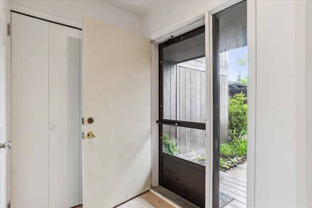 entryway featuring light wood finished floors