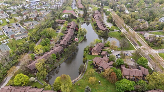 aerial overview of property's location featuring a large body of water and nearby suburban area