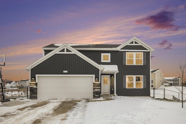 view of front of property with a garage