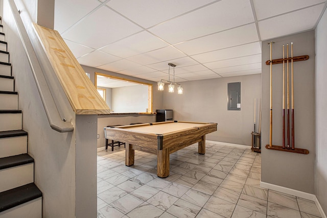 playroom with a paneled ceiling, electric panel, and billiards