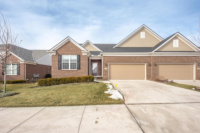 view of front of property with a garage and a front yard