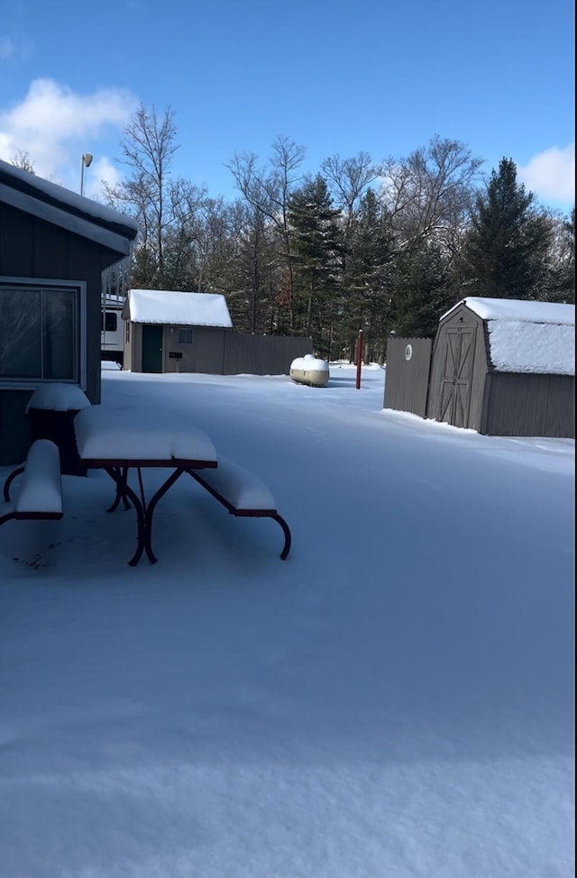 view of yard covered in snow