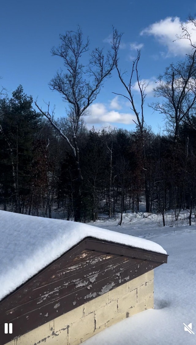 view of snow covered pool