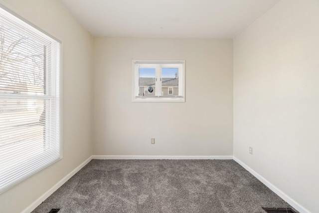 view of carpeted spare room