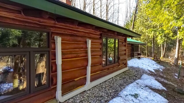 6919 E Free Soil Rd, Free Soil, MI 49411 - view of property exterior with log exterior