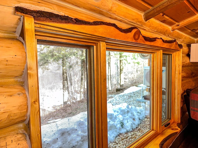 6919 E Free Soil Rd, Free Soil, MI 49411 - room details with log walls
