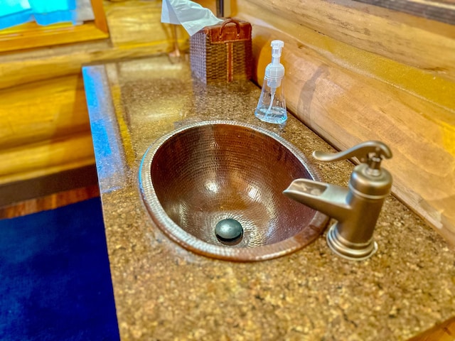 6919 E Free Soil Rd, Free Soil, MI 49411 - interior details featuring log walls
