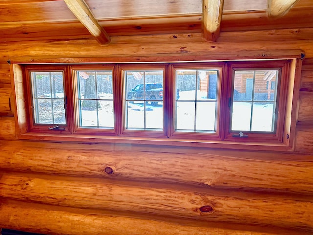 6919 E Free Soil Rd, Free Soil, MI 49411 - details featuring rustic walls and beam ceiling