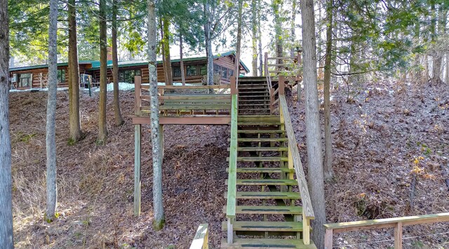 6919 E Free Soil Rd, Free Soil, MI 49411 - view of yard featuring stairs and a deck