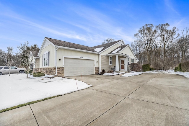 ranch-style home with a garage