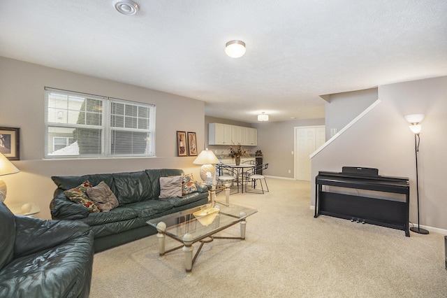 living room featuring light carpet