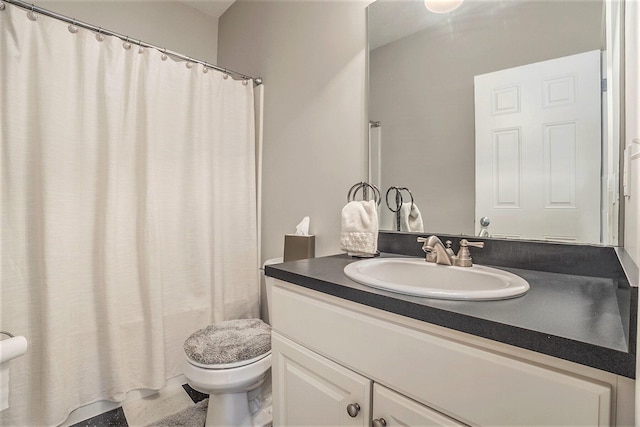 full bathroom with vanity, toilet, and shower / bath combo