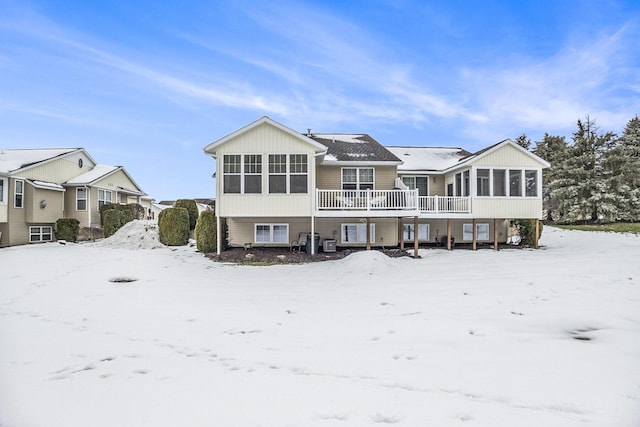 view of snow covered house