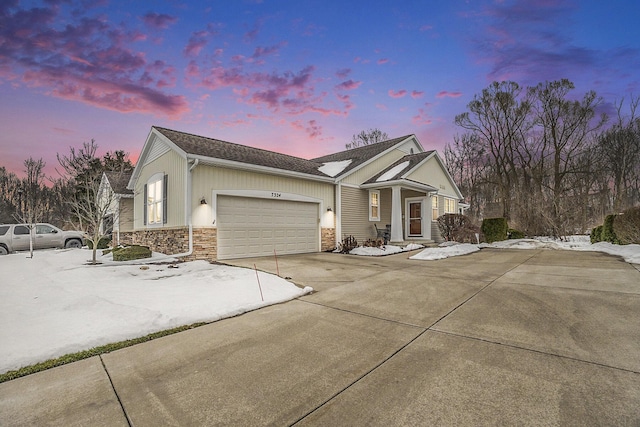 view of front of home with a garage