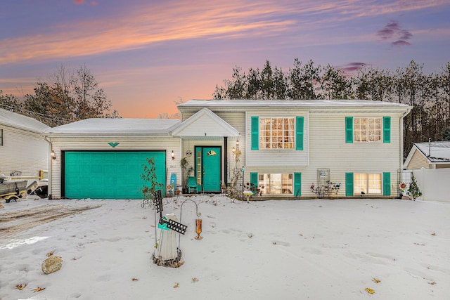 view of front of property featuring a garage