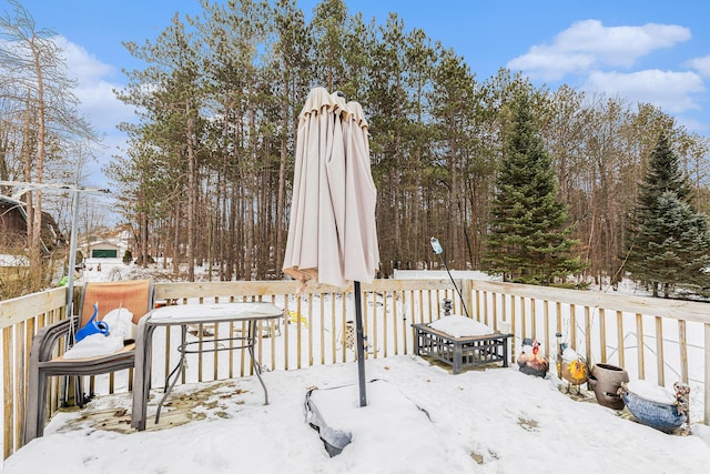 view of snow covered deck