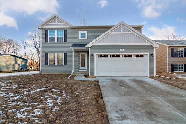 view of front of property with a garage