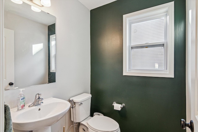 bathroom featuring sink and toilet