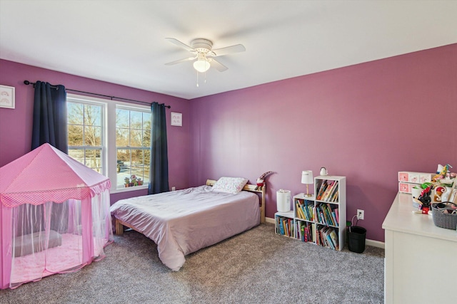 bedroom with ceiling fan and carpet flooring