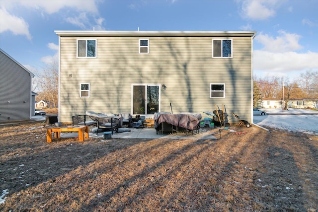 rear view of house featuring a patio area