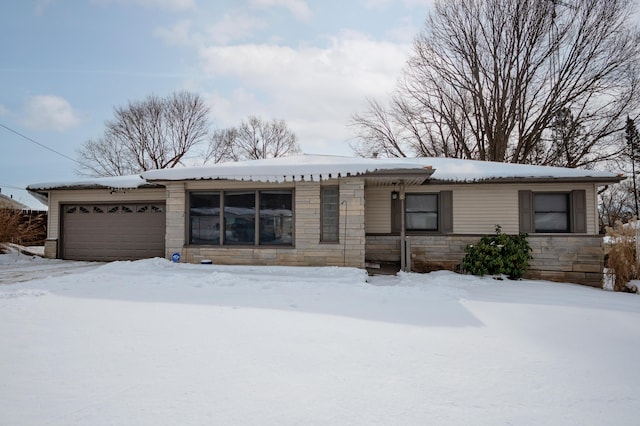 ranch-style home with a garage