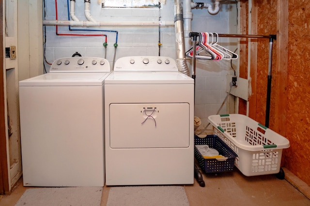 laundry area with washing machine and dryer