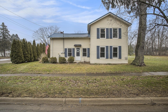 view of front facade featuring a front yard