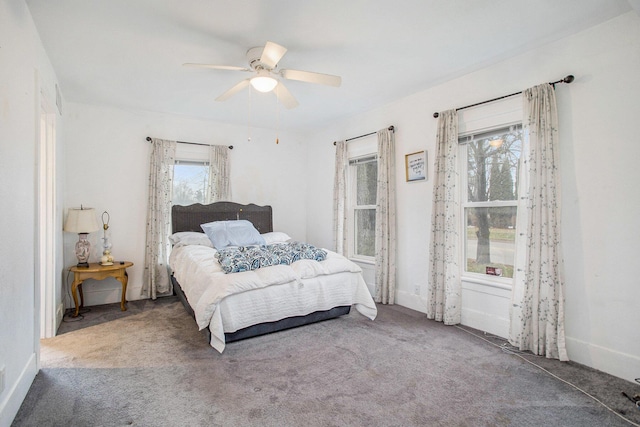 bedroom with ceiling fan and carpet flooring