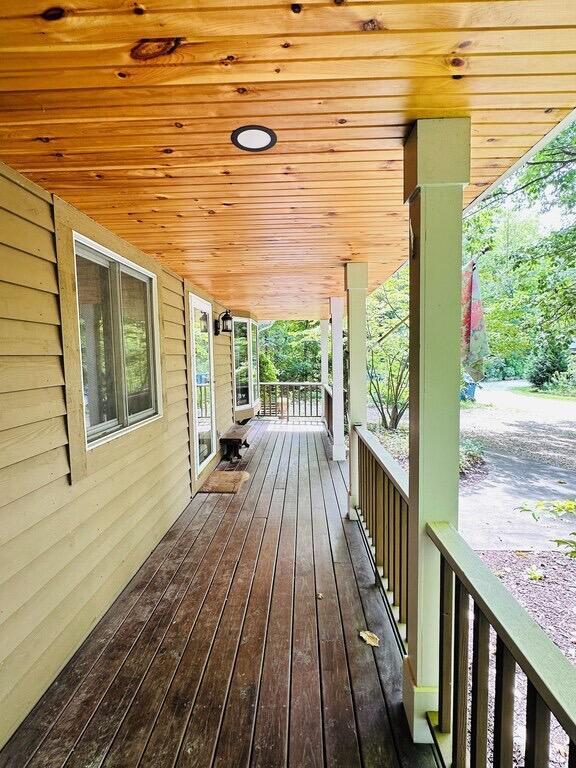 wooden terrace with covered porch