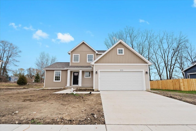 view of front of property with a garage