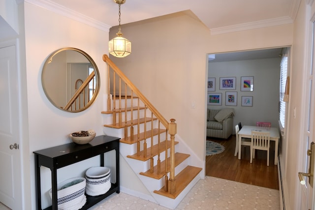 stairway featuring ornamental molding