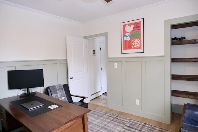 office space with crown molding, light wood-type flooring, and baseboard heating