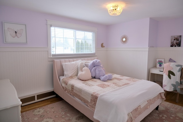 bedroom featuring hardwood / wood-style flooring