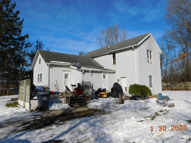 view of snow covered property