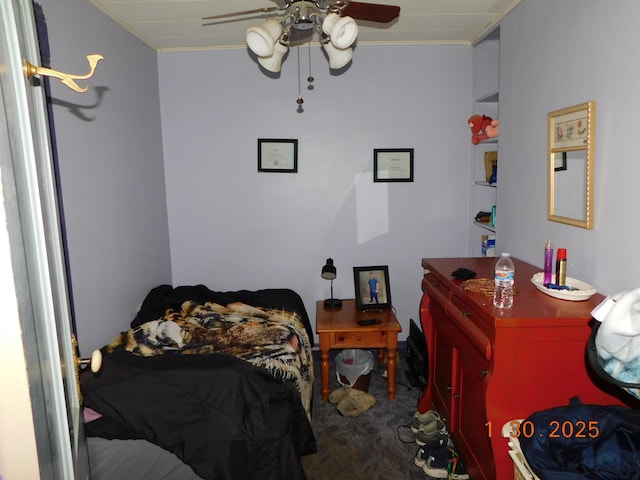 carpeted bedroom with ceiling fan