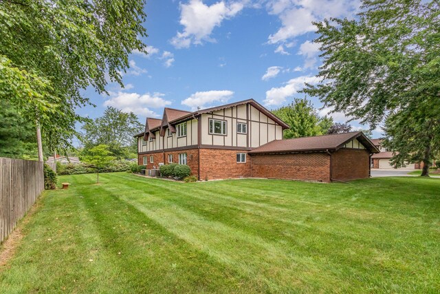 5410 Country Aire Dr Unit 13, Coloma, MI 49038 - exterior space featuring a lawn