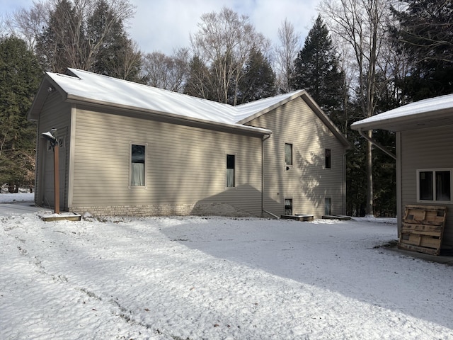 view of snow covered property