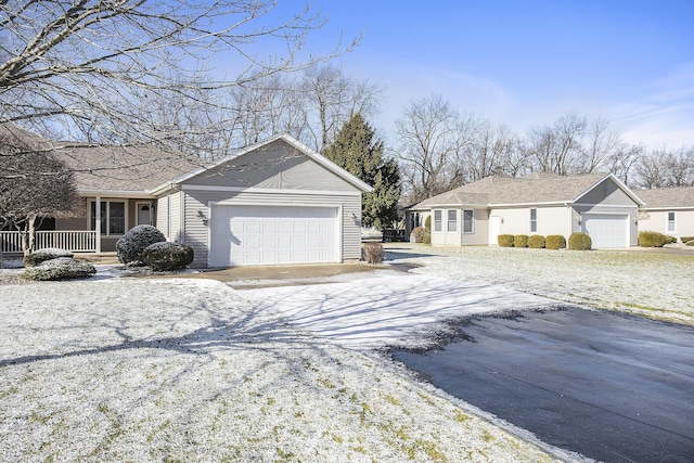 view of front of home featuring a garage and covered porch