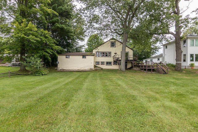 view of yard featuring a wooden deck