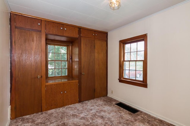 unfurnished bedroom featuring carpet floors