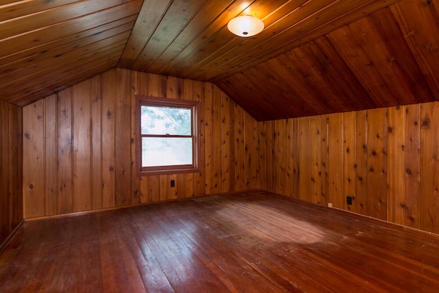 bonus room featuring dark wood-type flooring, wood ceiling, lofted ceiling, and wooden walls