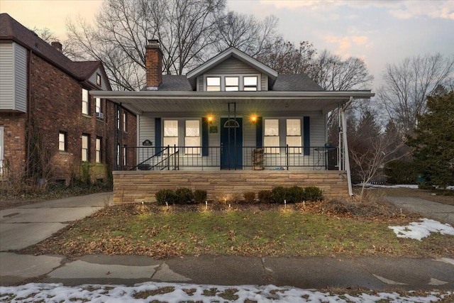 bungalow featuring a porch