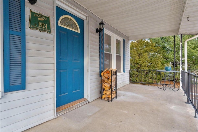 entrance to property with a porch