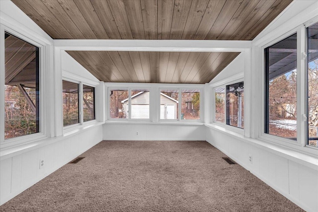 unfurnished sunroom featuring wood ceiling and vaulted ceiling