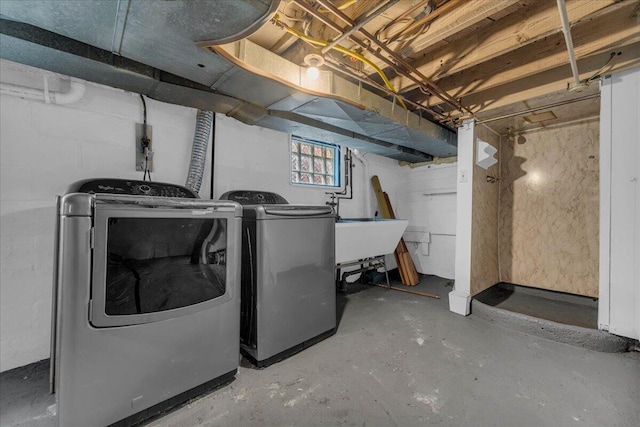 laundry room featuring separate washer and dryer