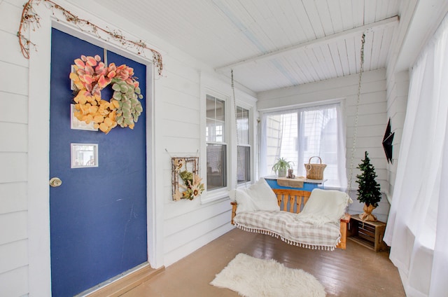 living area with hardwood / wood-style floors