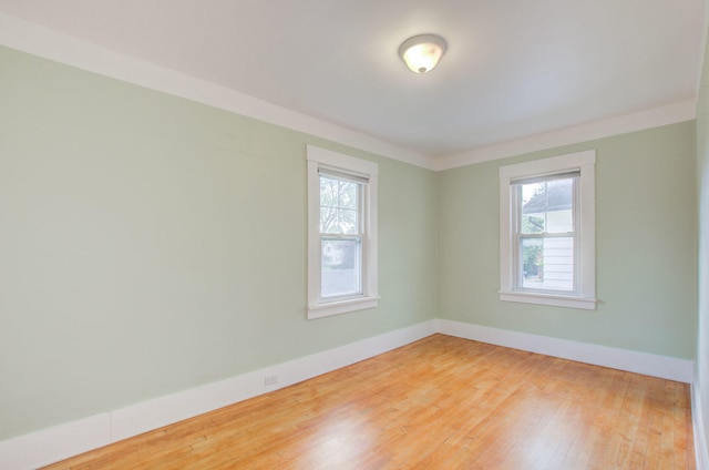 unfurnished room featuring wood-type flooring