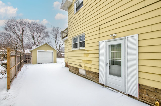 exterior space with a garage and an outdoor structure