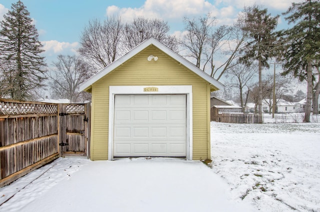 view of snow covered garage