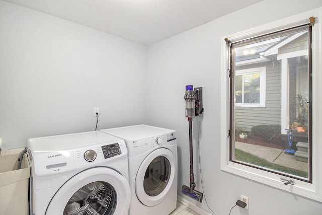 laundry room featuring independent washer and dryer